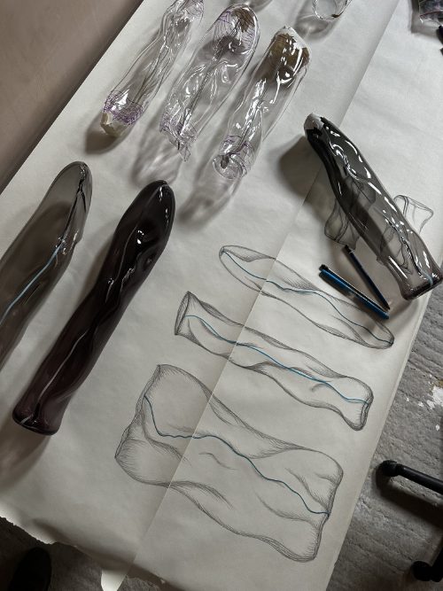 Blown glass sample pieces and preparatory drawings made during the AA2A residency.