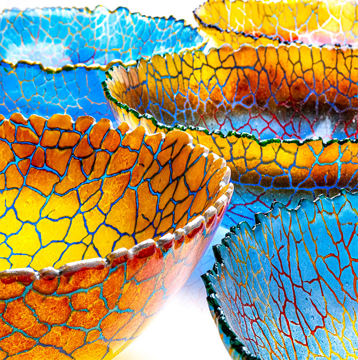 A collection of deep bowls from the recent 'Homecoming Series' highlights new work incorporating transparent powders.