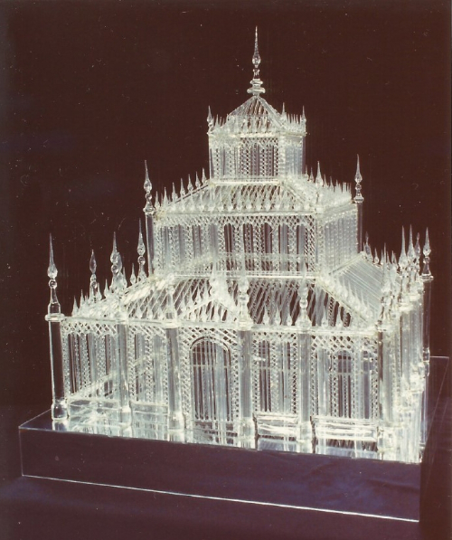 An intricate building made entirely of clear, flameworked glass for a tv show.
