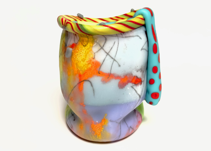 Glass vessel by Scott Chaseling featuring multicoloured glass made with fusing and blowing as well as reverse painting techniques.