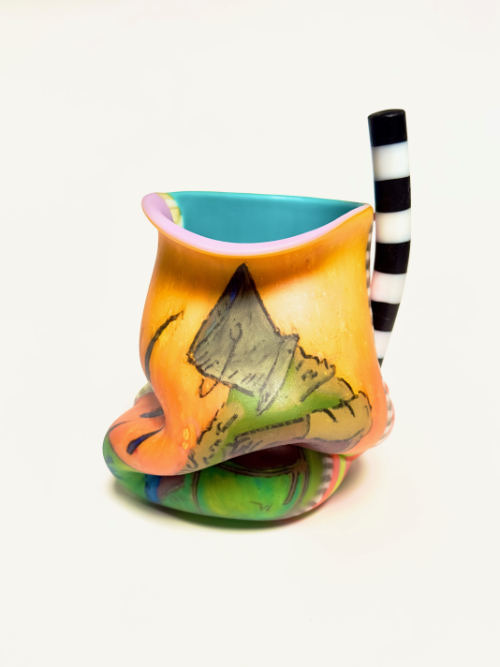 Moulded wonky glass vessel featuring reverse-painted figure on orange ground and black and white stripe vertical tube on the side.