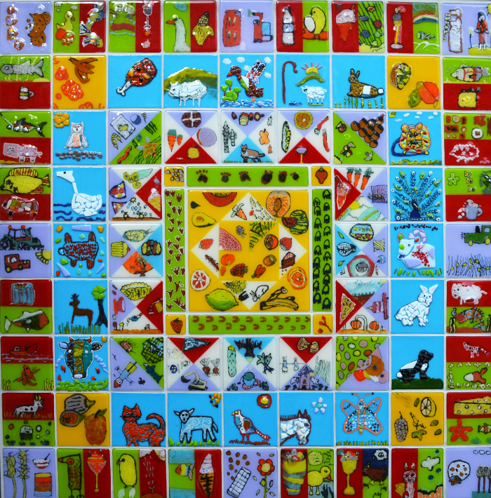 A glass 'quilt' made from squares of coloured glass by pupils at Narberth school with help from Linda Norris.