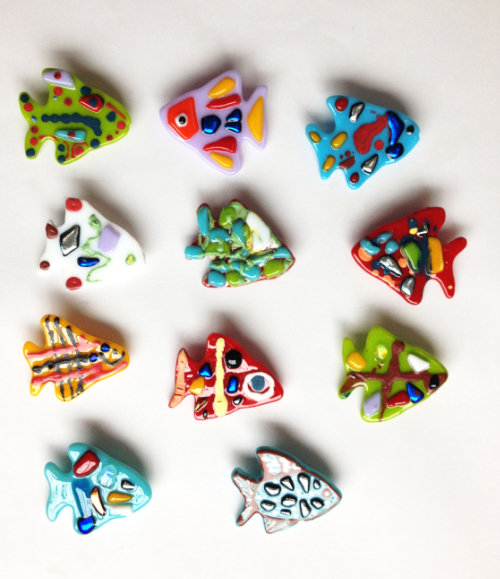 The fused glass badges made at the start of the project.