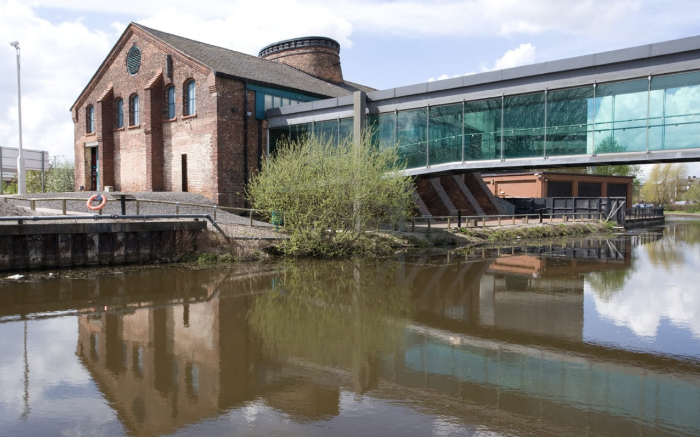 Image of The World of Glass museum from outside across water