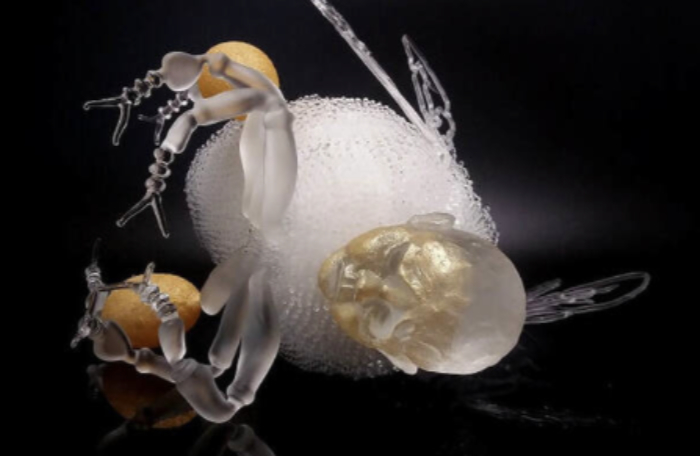 A curious glass piece called Last Flight of the Bumblebee by Krista Israel De Jager features a white bumblebee body shape with a glass human head.