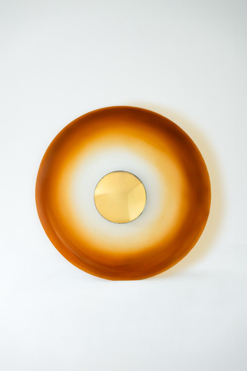 Sculptural Amber Glass Wall Mirror with Angel-Gilded Convex Gold Center Sculptural Amber Glass Wall Mirror with Angel-Gilded Convex Gold Center